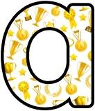 Gold awards background instant display lettering sets. Background includes images of gold stars, trophies, medals, rosettes etc.